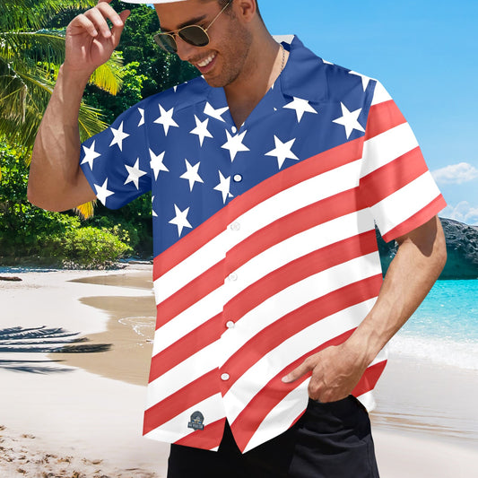 Man wearing [Brand] USA flag shirt on tropical beach.