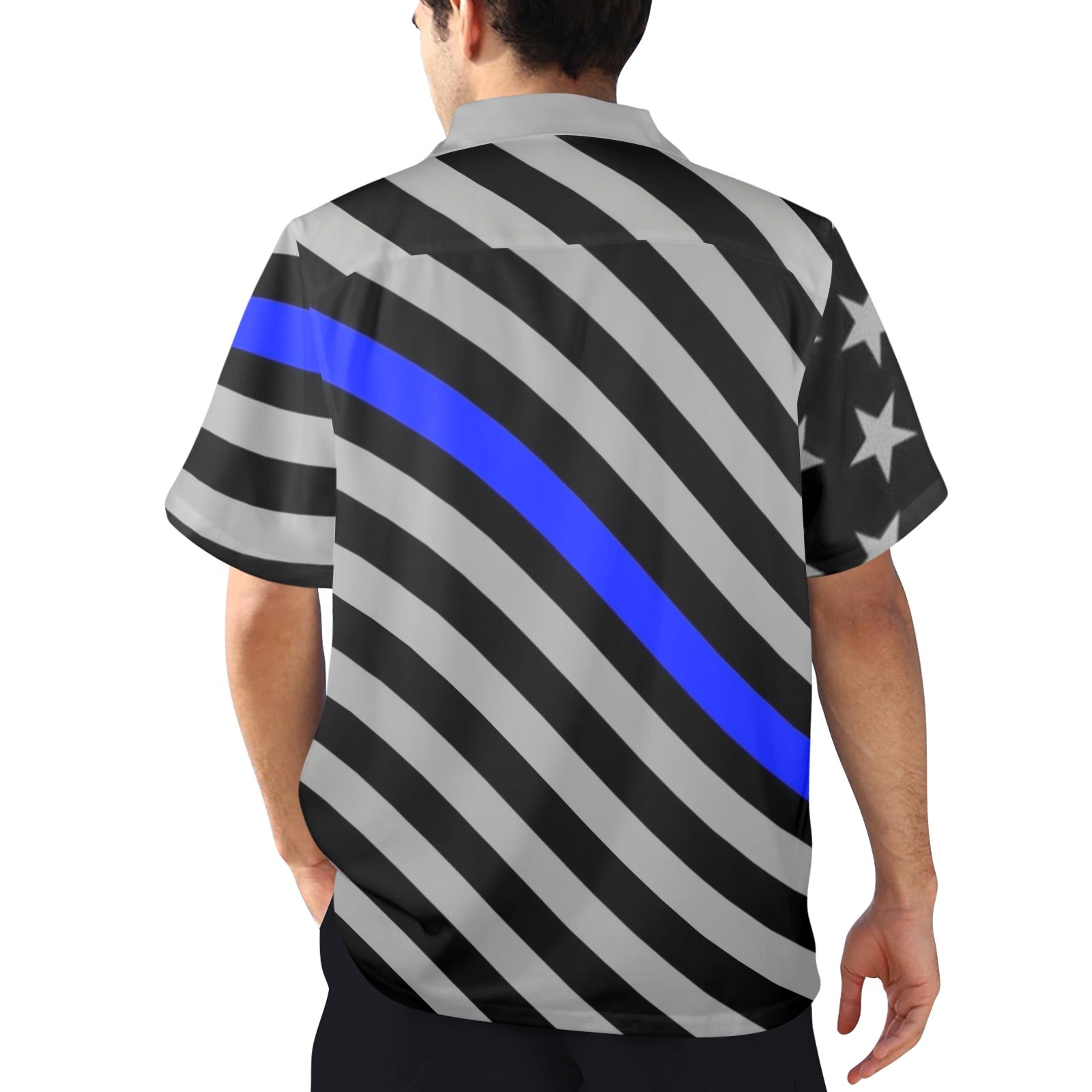 Man wearing [Brand] shirt with blue-striped flag design.