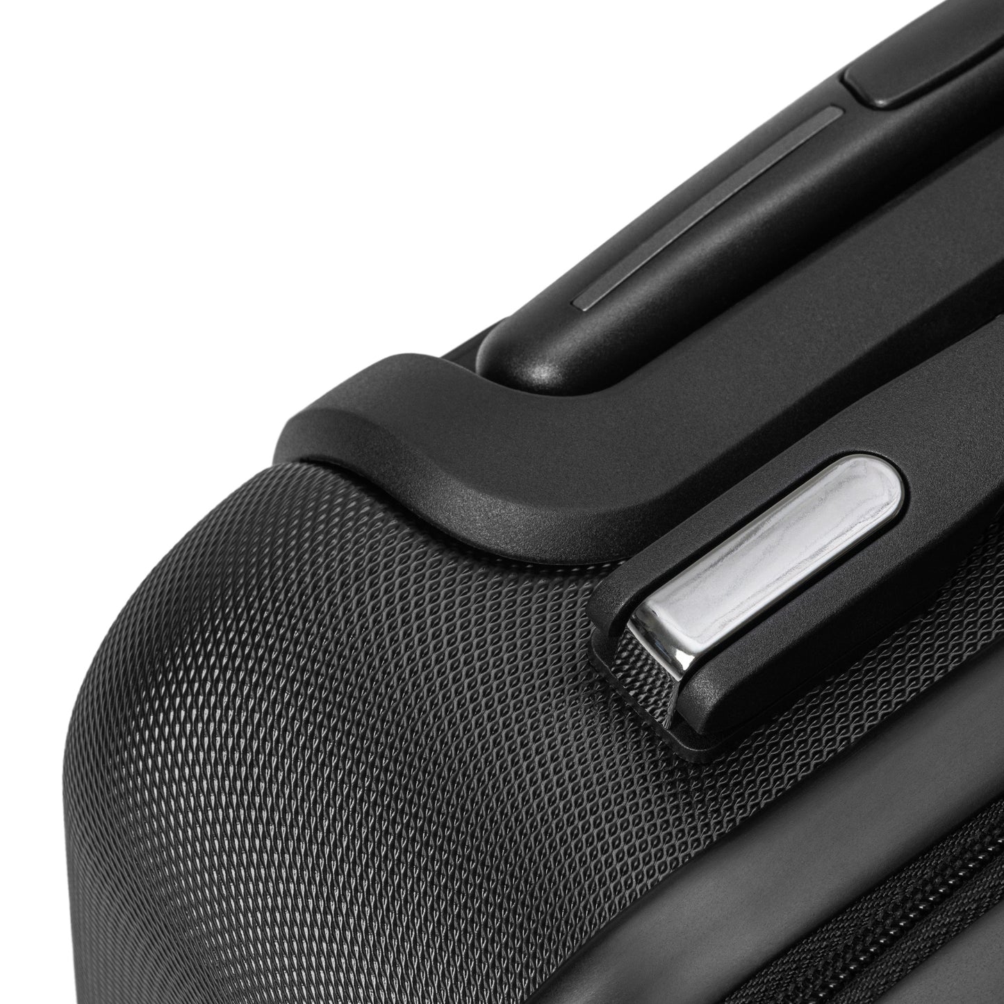 Close-up of [Brand] suitcase corner with textured black finish.