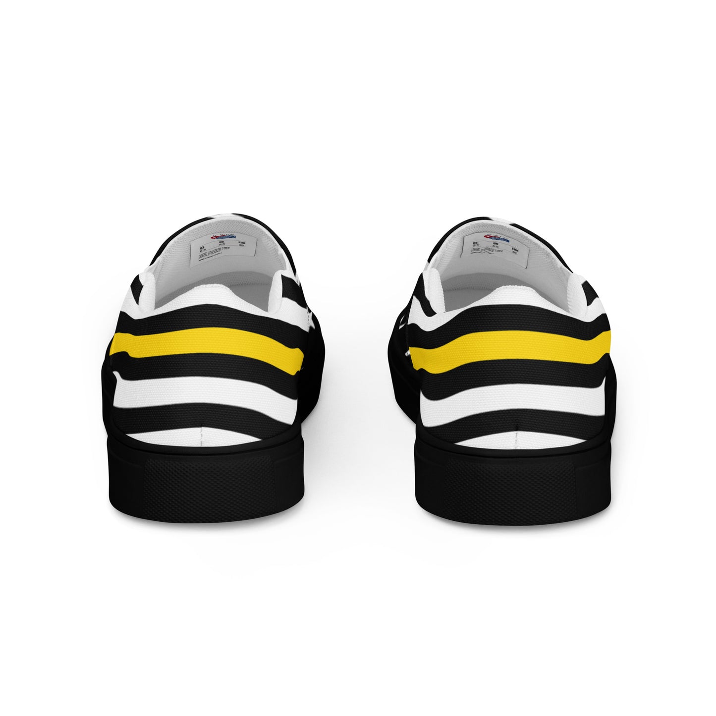 Black and white sneakers with yellow stripe, [Brand].