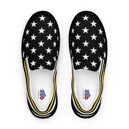 Black slip-ons with white stars, yellow accents, [Brand].