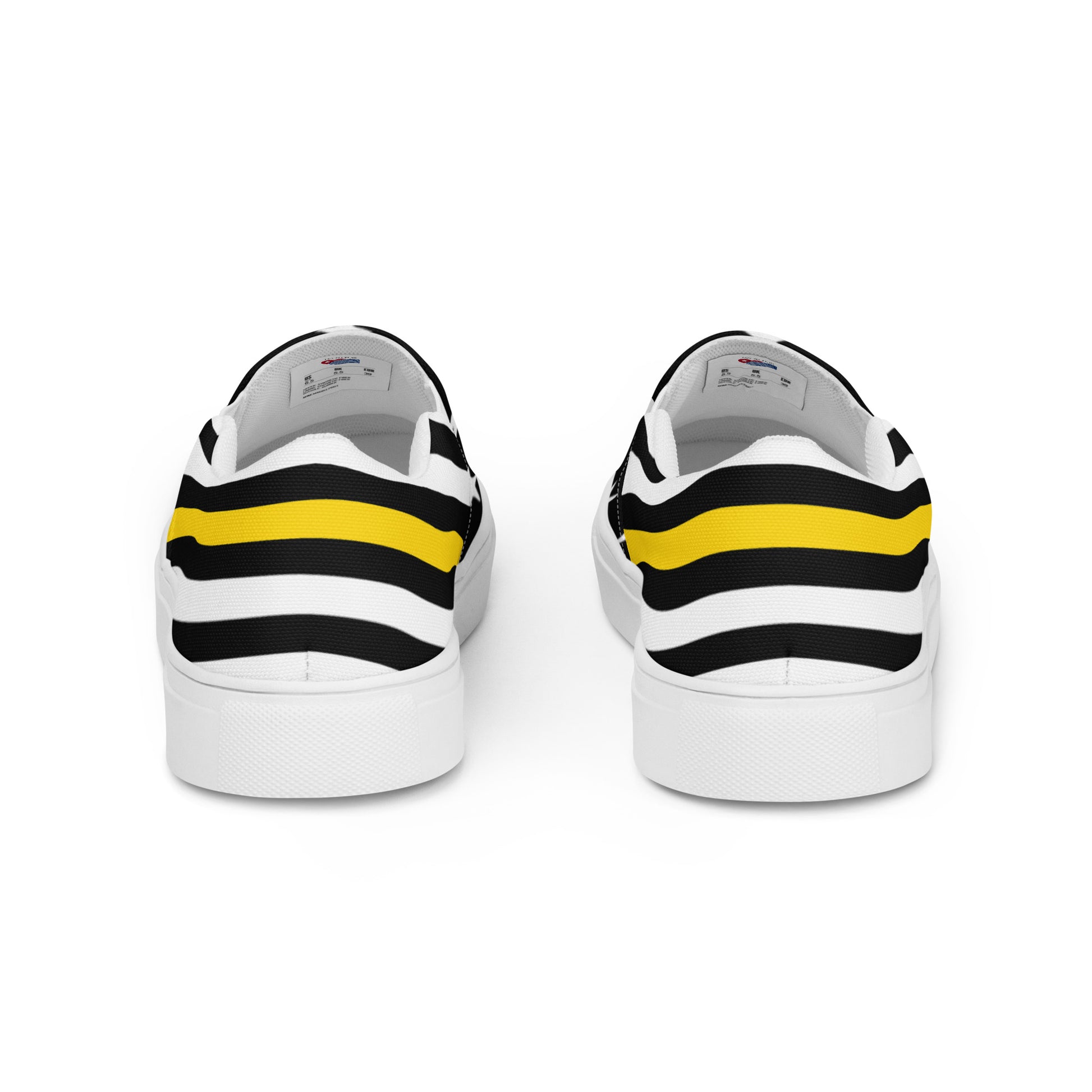 [Brand] sneakers with black, white, yellow striped design.